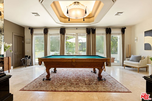 rec room with a raised ceiling, ornamental molding, and billiards