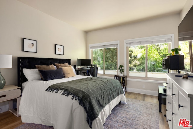 bedroom featuring light hardwood / wood-style flooring