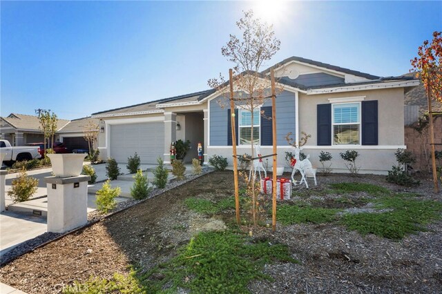 single story home featuring a garage