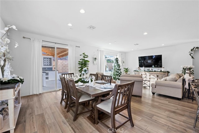 dining space featuring light hardwood / wood-style flooring