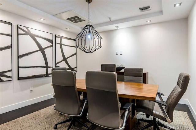 dining room featuring dark wood-type flooring