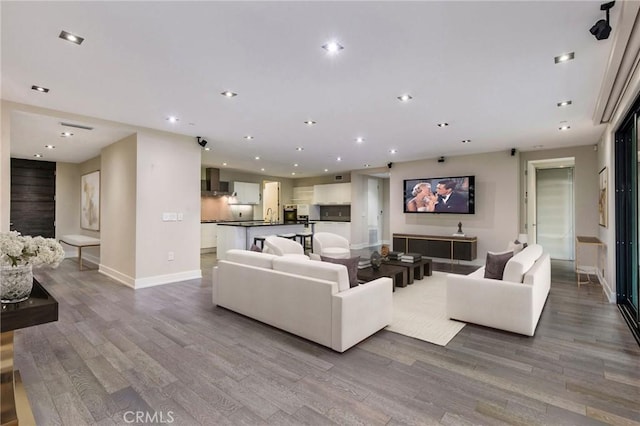 living room with light hardwood / wood-style flooring