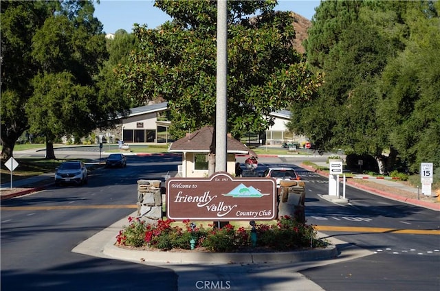 view of community sign