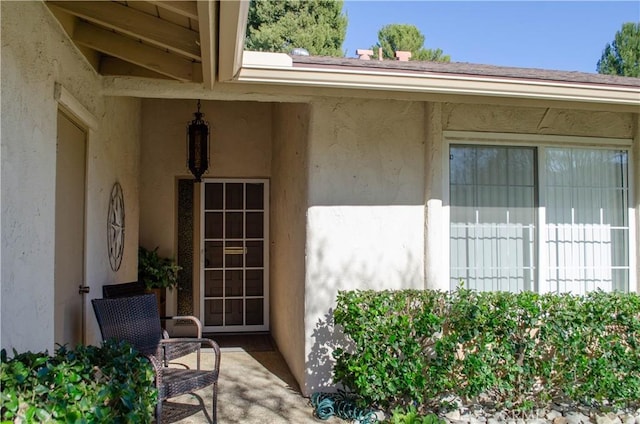 doorway to property featuring a patio