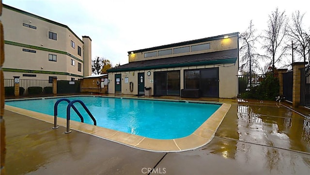 view of pool with a patio area