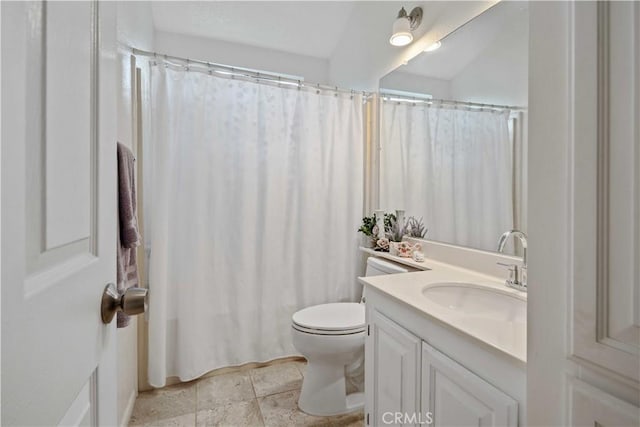 bathroom with a shower with shower curtain, vanity, and toilet