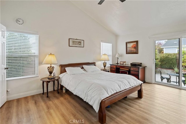 bedroom with high vaulted ceiling, ceiling fan, access to outside, and light hardwood / wood-style flooring