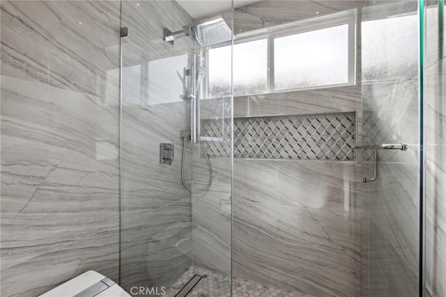 3821 S Muirfield Rd, Los Angeles, CA 90008 - bathroom featuring a marble finish shower and toilet