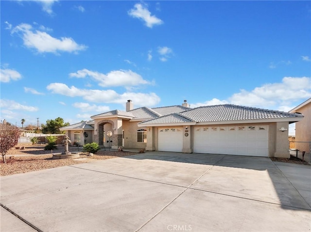 view of front of property featuring a garage