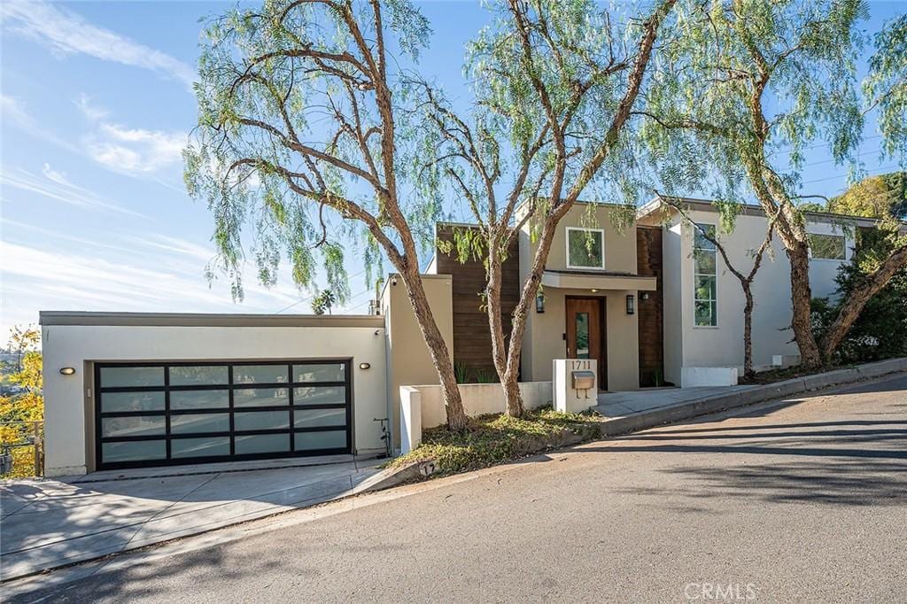 modern home featuring a garage