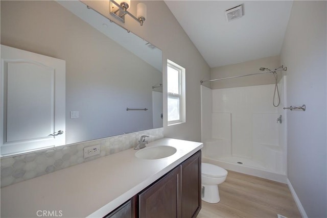 1592 Deer Canyon Rd, Arroyo Grande, CA 93420 - bathroom featuring toilet, wood finished floors, vanity, a shower, and lofted ceiling