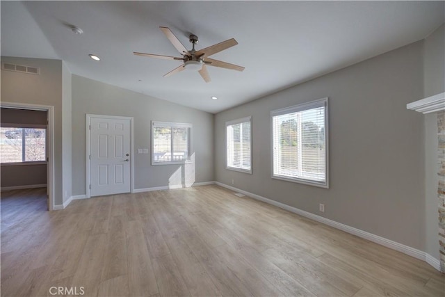 interior space featuring ceiling fan, light hardwood / wood-style flooring, and lofted ceiling