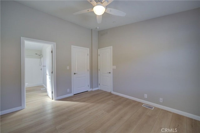 unfurnished bedroom with light hardwood / wood-style floors and ceiling fan