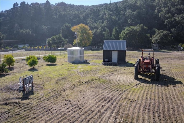 1592 Deer Canyon Rd, Arroyo Grande, CA 93420 - view of yard with a storage unit, an outdoor structure, and fence