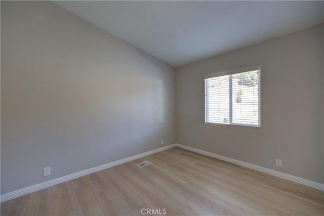 empty room featuring light hardwood / wood-style floors