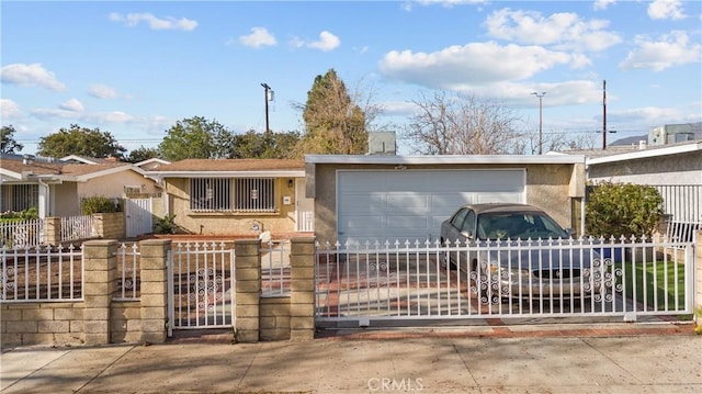 ranch-style house featuring a garage