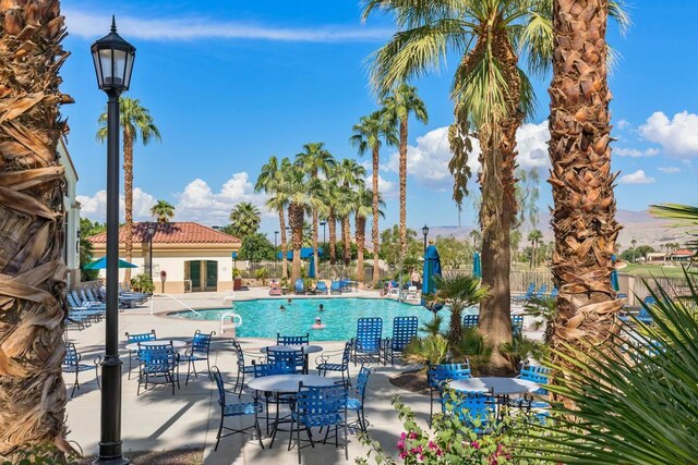 view of pool featuring a patio area