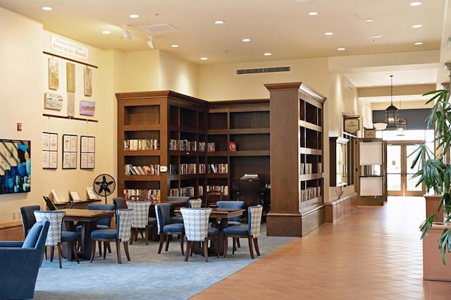 interior space featuring a towering ceiling