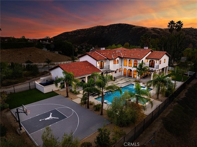 aerial view at dusk with a mountain view