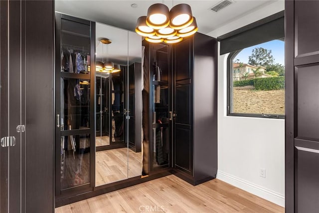 doorway to outside featuring light wood-type flooring