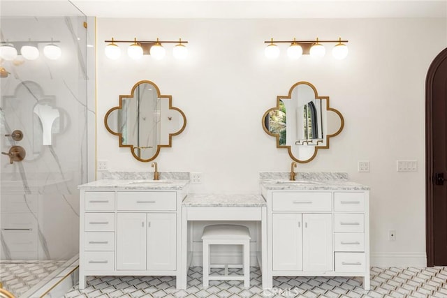 bathroom with a shower and vanity