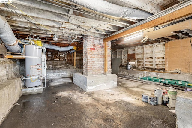 basement featuring strapped water heater