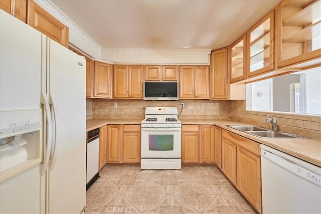 kitchen featuring decorative backsplash, white appliances, light tile patterned flooring, ornamental molding, and sink