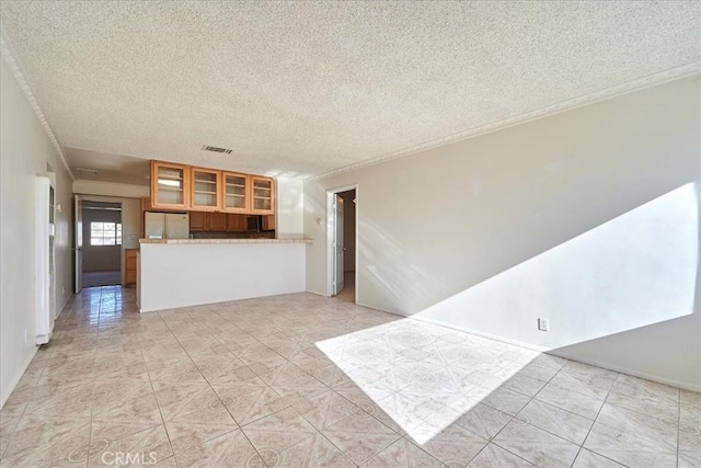 interior space with a textured ceiling