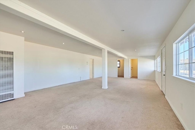 spare room with light colored carpet