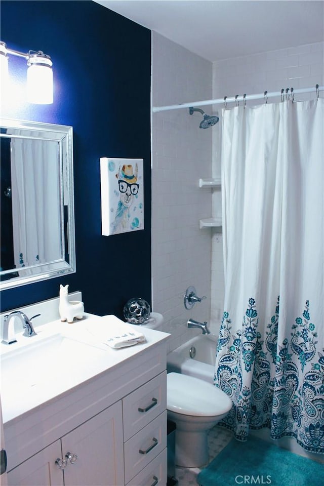 full bathroom featuring toilet, vanity, and shower / tub combo