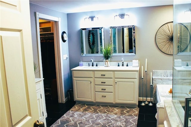 bathroom with vanity and separate shower and tub