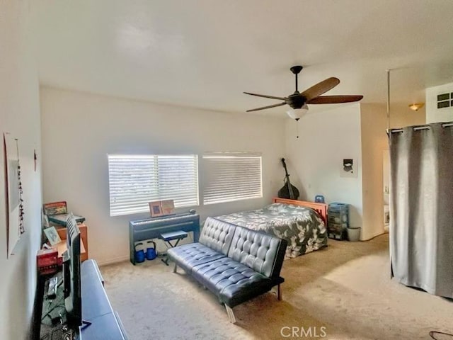 bedroom featuring carpet flooring and a ceiling fan