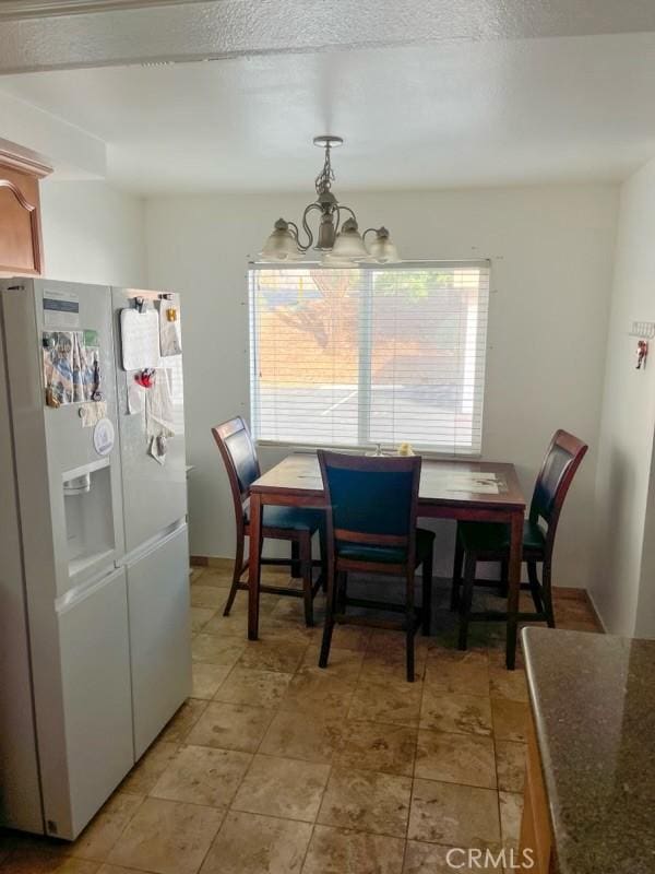 dining room featuring an inviting chandelier