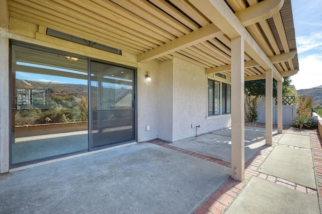 view of patio / terrace with a mountain view