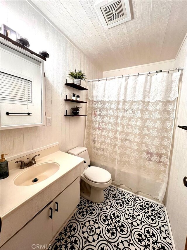 full bathroom with shower / bath combination with curtain, vanity, wooden walls, wooden ceiling, and toilet