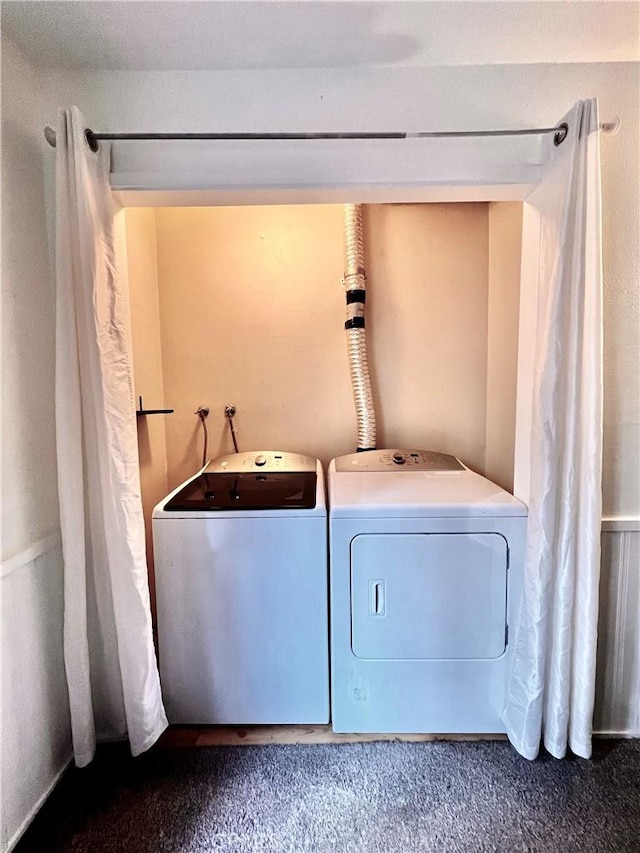 laundry room featuring carpet and washing machine and dryer