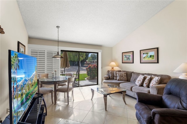 tiled living room with a textured ceiling and lofted ceiling