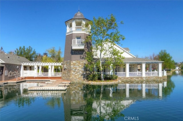 exterior space with a water view