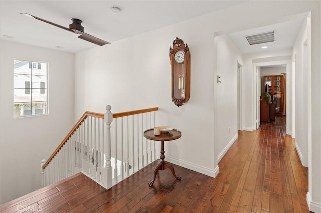 hallway featuring dark hardwood / wood-style floors