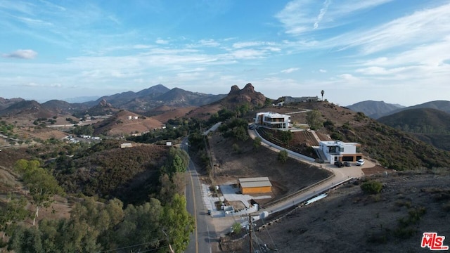 drone / aerial view featuring a mountain view