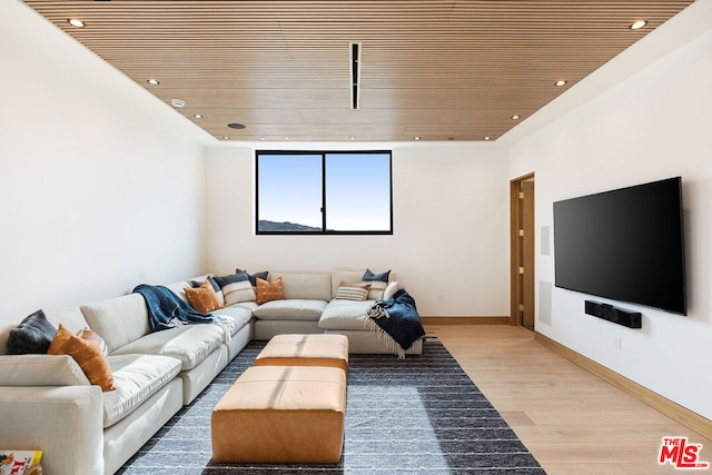 living room with wood ceiling and hardwood / wood-style flooring