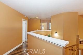 hallway featuring hardwood / wood-style floors