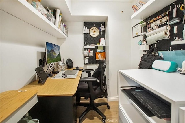 office area with light wood-type flooring