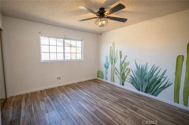 58168 Canterbury St, Yucca Valley, CA 92284 - unfurnished room with wood finished floors, a textured ceiling, and ceiling fan