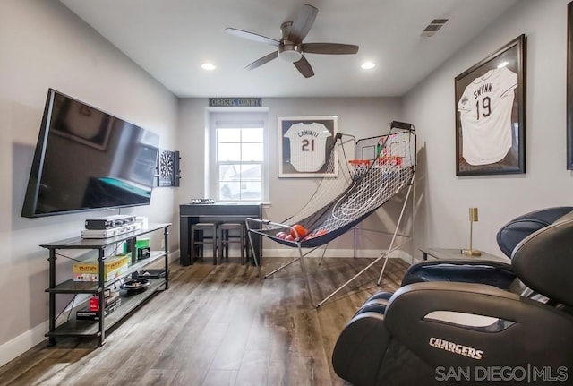 rec room with hardwood / wood-style flooring and ceiling fan