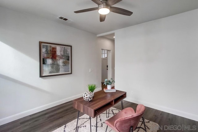 office space with dark hardwood / wood-style floors and ceiling fan