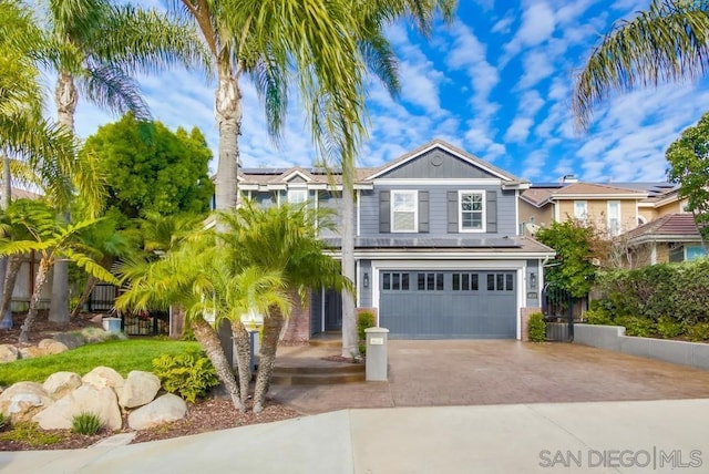 view of front of home with a garage