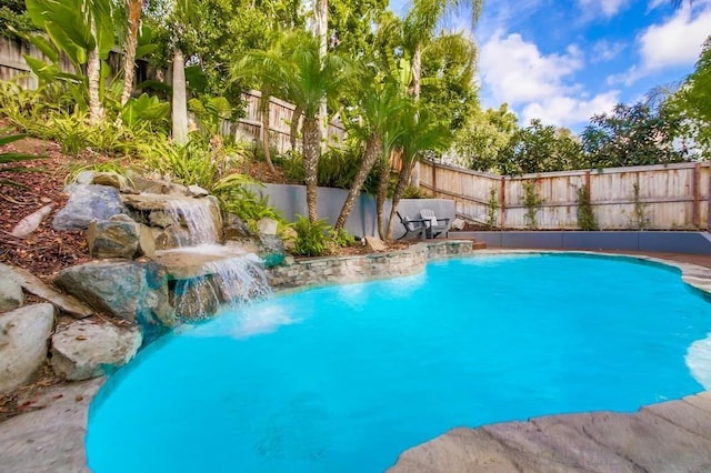 view of pool featuring pool water feature