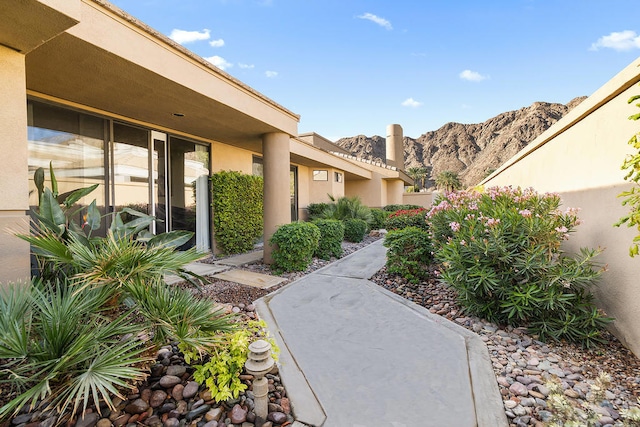 exterior space featuring a mountain view