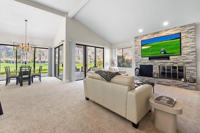 living room with beam ceiling, a tile fireplace, an inviting chandelier, high vaulted ceiling, and light colored carpet